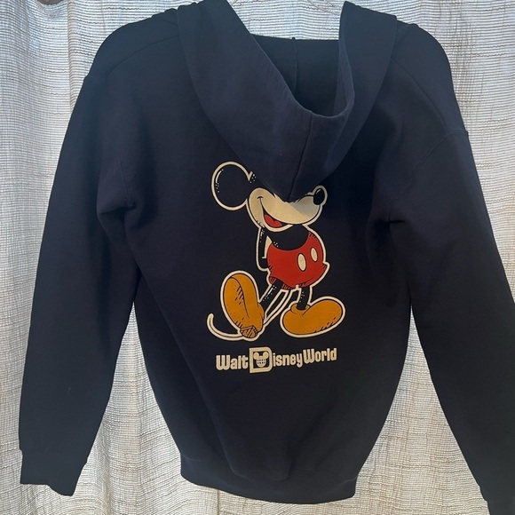 Disney Tops - This Disney World Hoodie Sweatshirt in Navy featuring Mickey Mouse